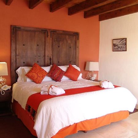 Casa Del Tio Hotel Boutique San Miguel de Allende Zimmer foto A bedroom at Hotel San Cristóbal