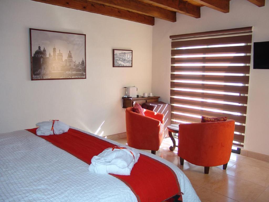 Casa Del Tio Hotel Boutique San Miguel de Allende Zimmer foto A room at the hotel